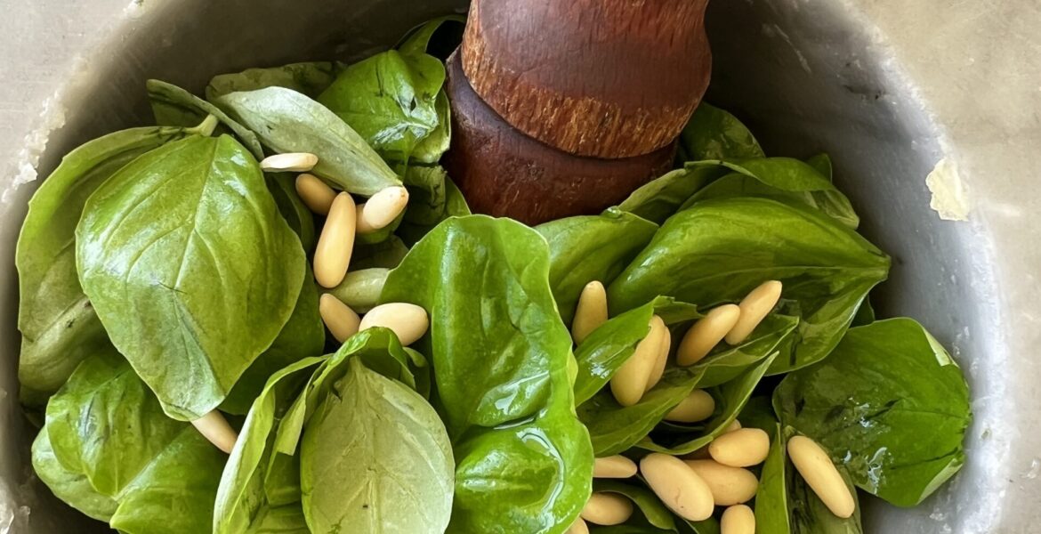 Pesto ingredients for Pesto in a pestle and mortar