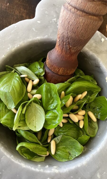 Pesto ingredients for Pesto in a pestle and mortar