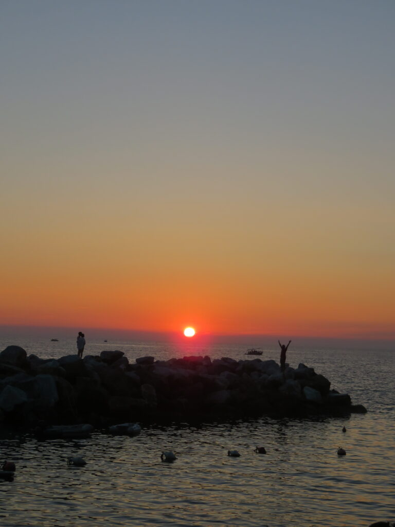 Gorgeous orange sunset from Riomaggiore in Cinque Terre