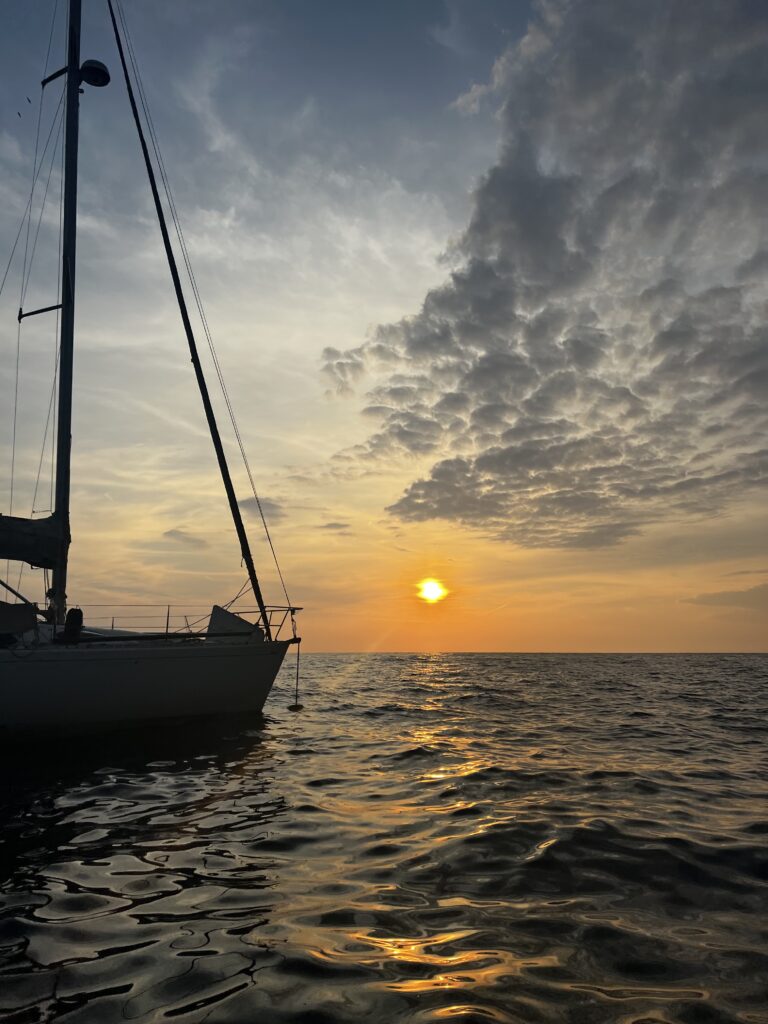 Sunset and yacht over the ocean 