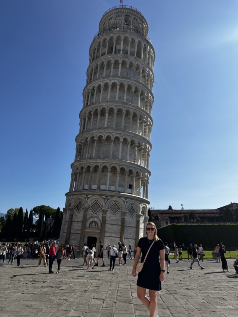 Standing in front of The Leaning Tower of Pisa