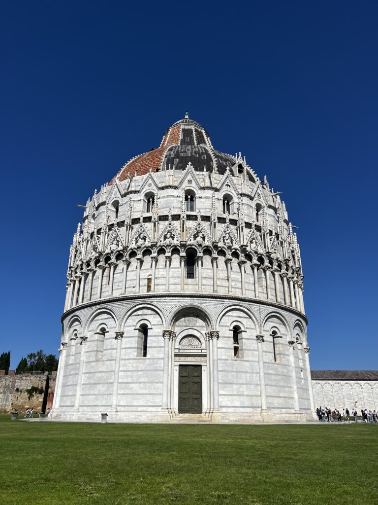 Pisa Baptistery is a beautiful structure outside the Leaning Tower of Pisa